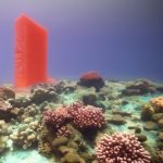 futuristic skyscraper made of coral reefs emerging from the ocean