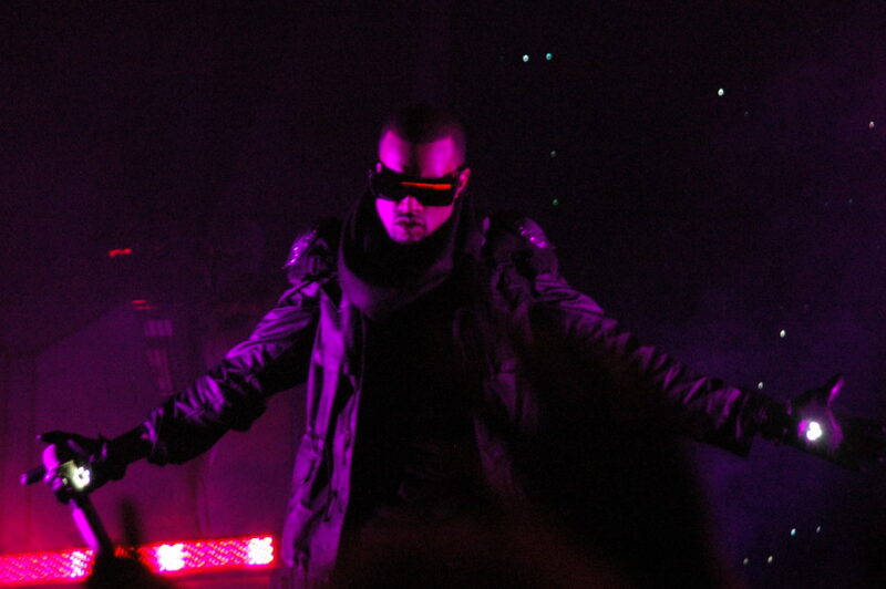 Kanye West performing with lights