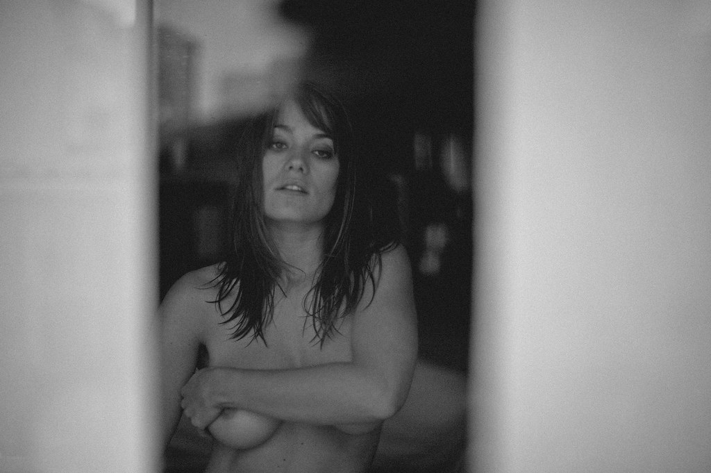 Margot Robbie black and white portrait related to Wolf of Wall Street outfit