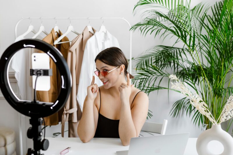 Stylish woman vlogging, TikTok influencer setup