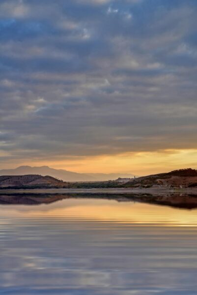 Sunset over lake Marrakech Lioness filming landscape