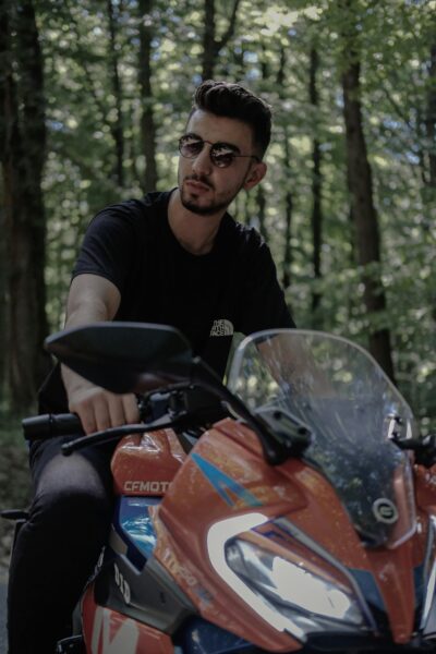 CFMoto motorcycle in forest