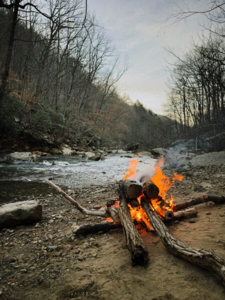 Campfire along forest stream near Red Room Cabins in Chattanooga Tennessee