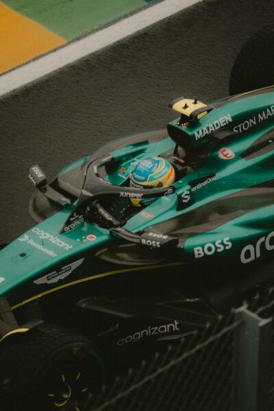 Close-up of a Formula One racing car on a track, capturing speed and precision.
