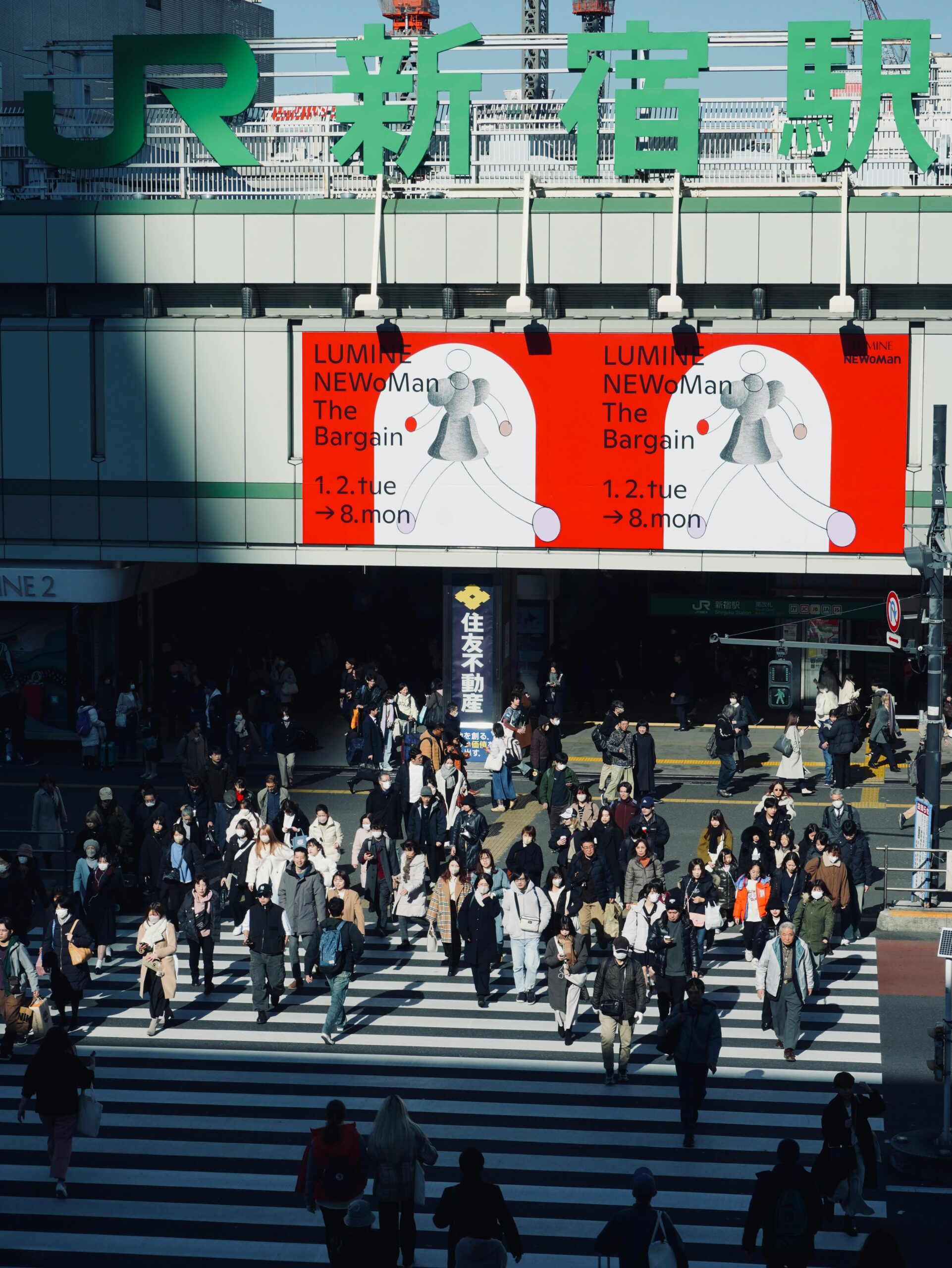 Pedestrians using a busy marked urban crossing