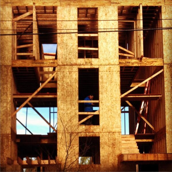 #osb #trynottobreathe #seattle #boomtown #provisional #architecture #thinksquare #rightangles #orientedstrandboard #construction #spareeveryexpense #sheathing #mostlyemptyspace