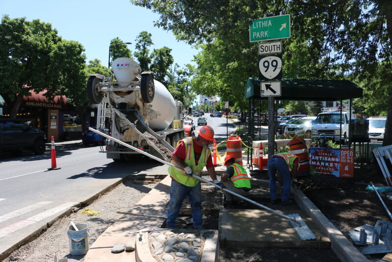 Concrete finishing next to Ashland Plaza