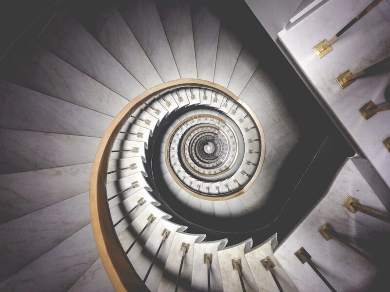 Spiral white stairs with a modern design