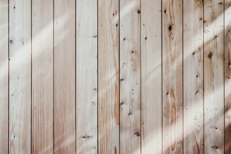 Close-up of a wooden wall with light accentuating texture