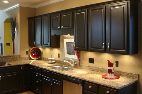 Kitchen Makeover 4 with black appliances and cabinetry.