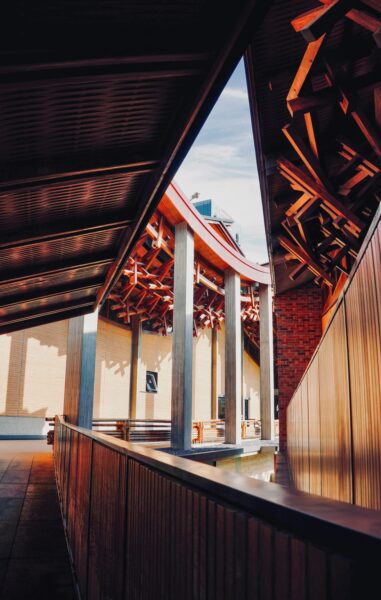 Captivating modern architecture featuring intricate wooden designs and open spaces.