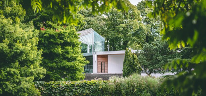 Aerial photography of house surrounded by trees at daytime