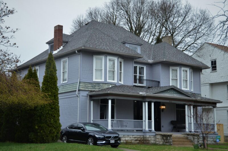 Gray and white 2 story frame home