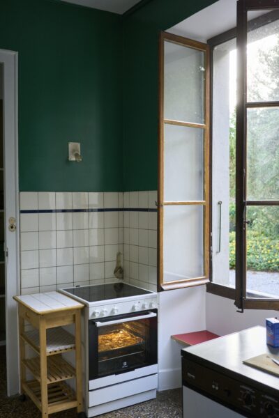 A kitchen with a sink and a window.