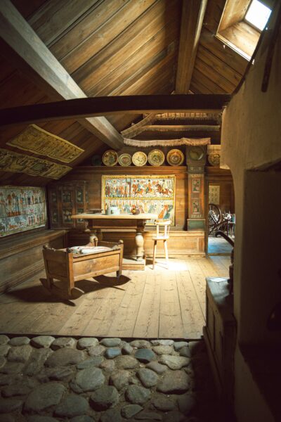 Inside a rustic, wooden room.