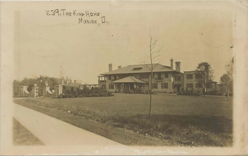 Historic estate with detached garage gardens.