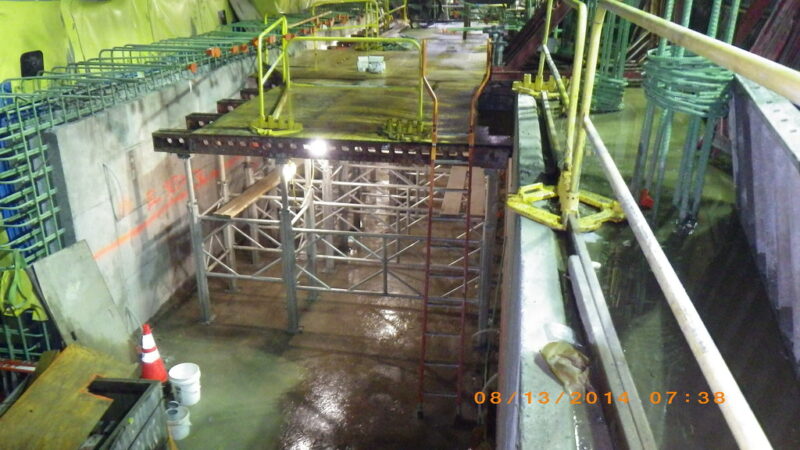 Installing Shoring Tower and Deck for Roof Slab in East Plenum