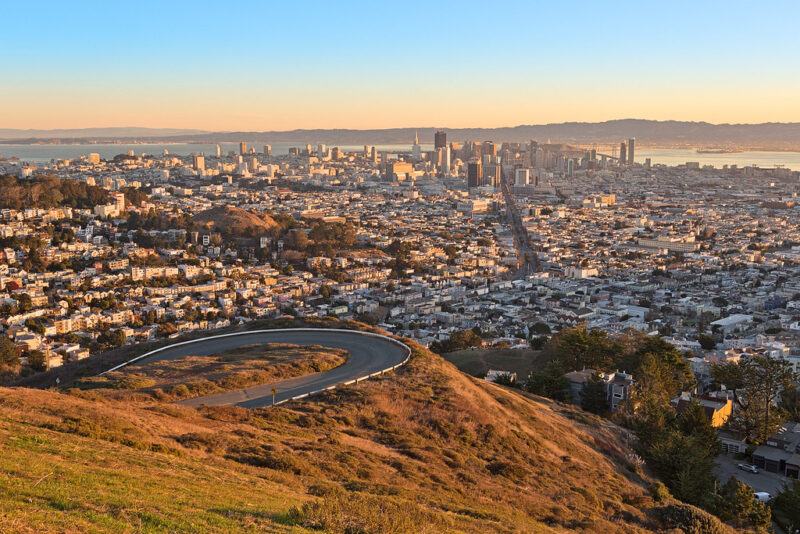 San Francisco Sunrise by Bold Frontiers, vibrant cityscape with brown exteriors.