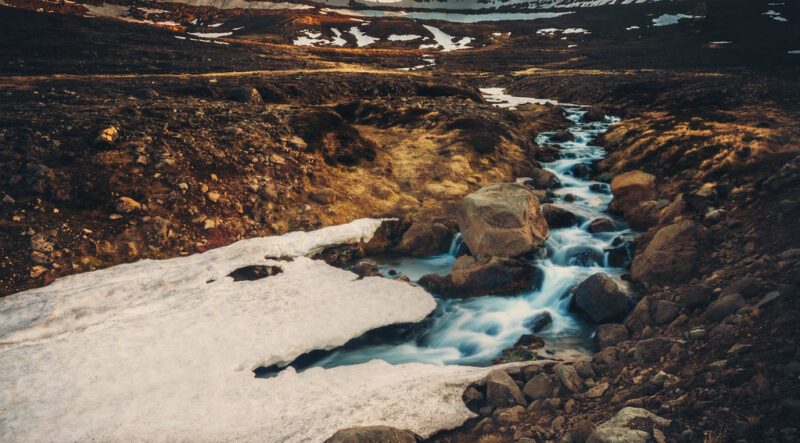 The Melt landscape with rocks and water by Trey Ratcliff