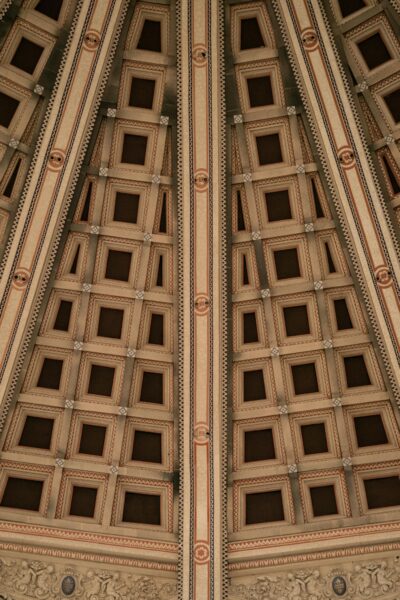 Elegant coffered ceiling design showcasing intricate architecture in Barcelona.