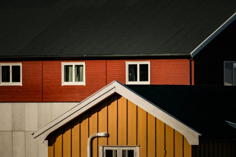 Vivid red and yellow Scandinavian houses with a minimalist and modern style.