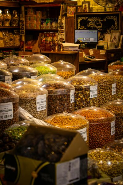 Vibrant spice and nut market display.