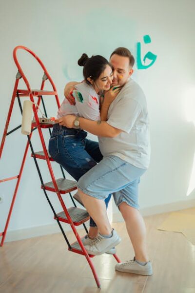 romantic couple painting together at home