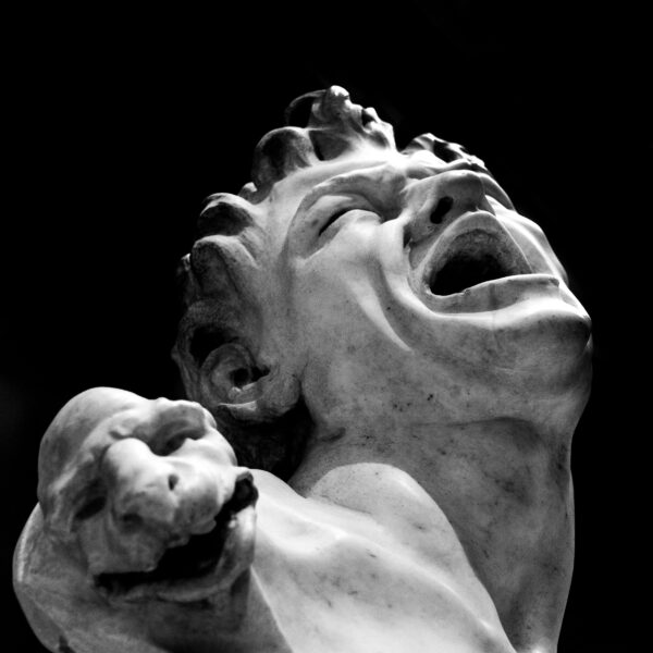Stunning black and white photograph of an expressive marble sculpture at The Met, NYC.