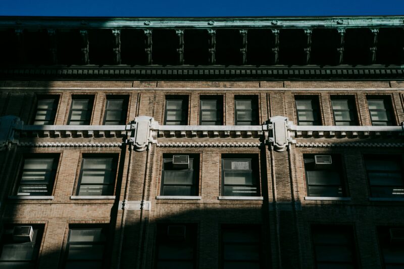 Facade of residential building with cornice
