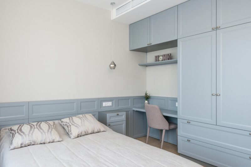 Stylish bedroom with built-in cabinetry.
