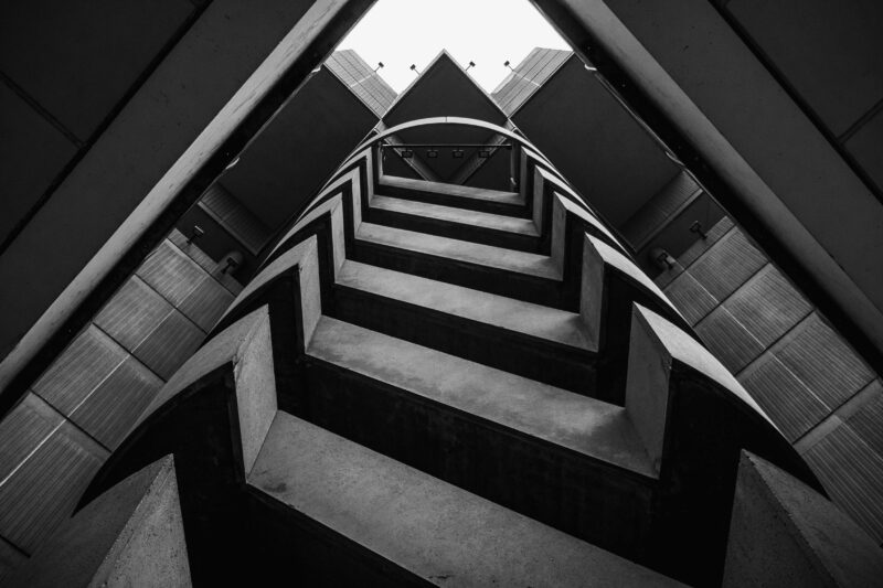 Low angle black and white view of striking Atlanta architecture showcasing modern design.