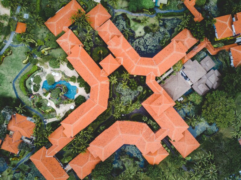 Aerial view of orange roofed house.