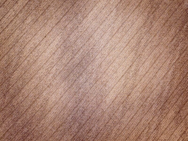 A close-up view of a wood grain surface.