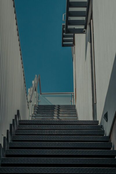 White and brown wooden staircase.