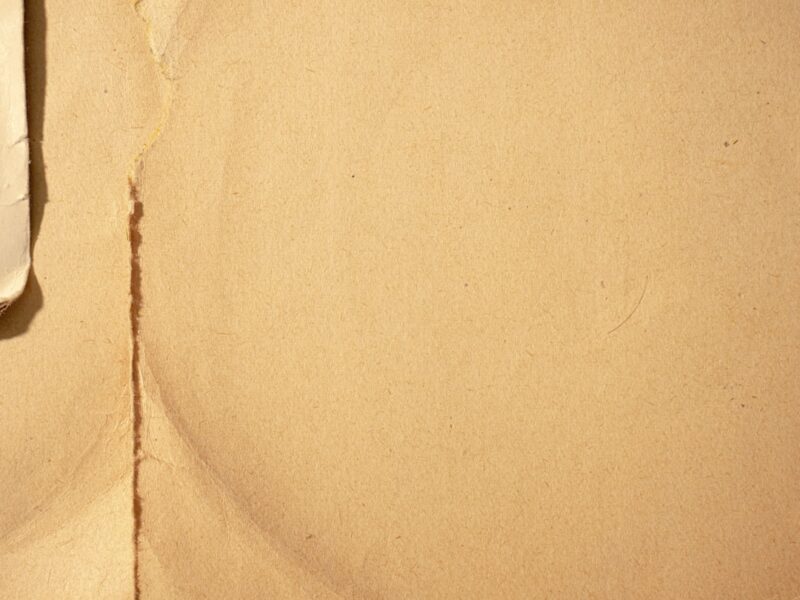 White textile on brown textile.