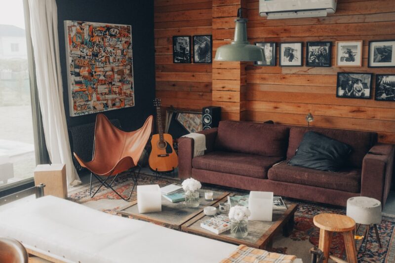 Brown sofa near white coffee table