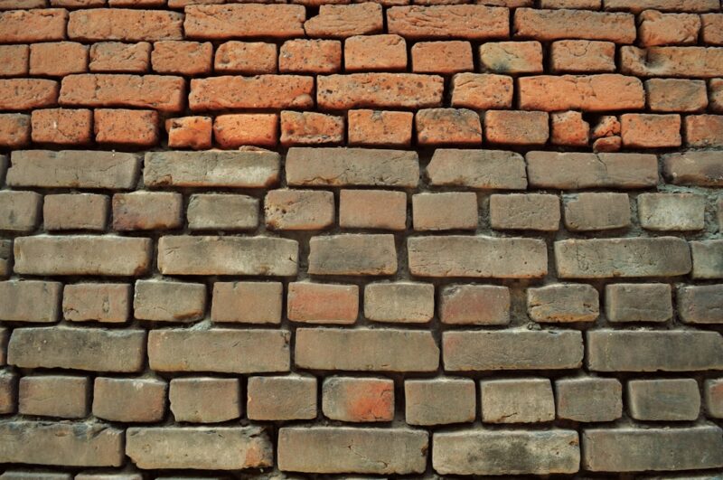 Brown and gray brick wall.
