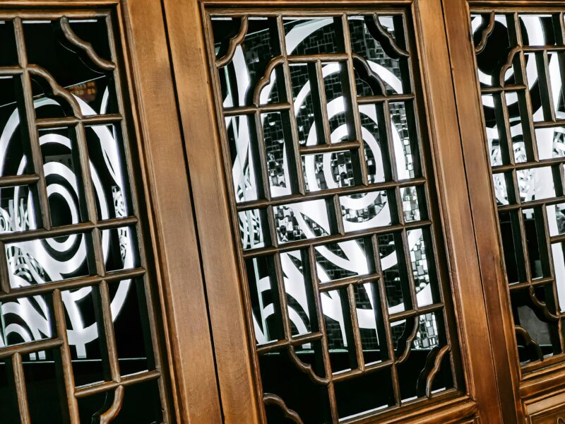 Brown wooden framed glass door