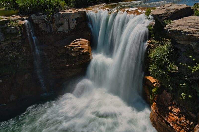 A waterfall with a large amount of water coming out of it