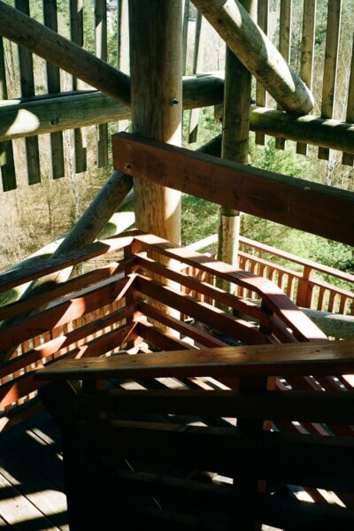 A wooden structure with a railing