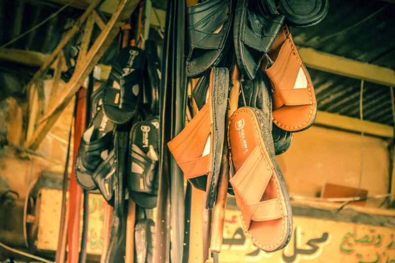A group of shoes on a shelf