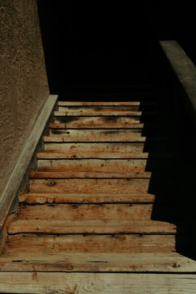A bunch of wooden steps leading up to a building