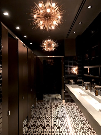 A room with a chandelier and a table