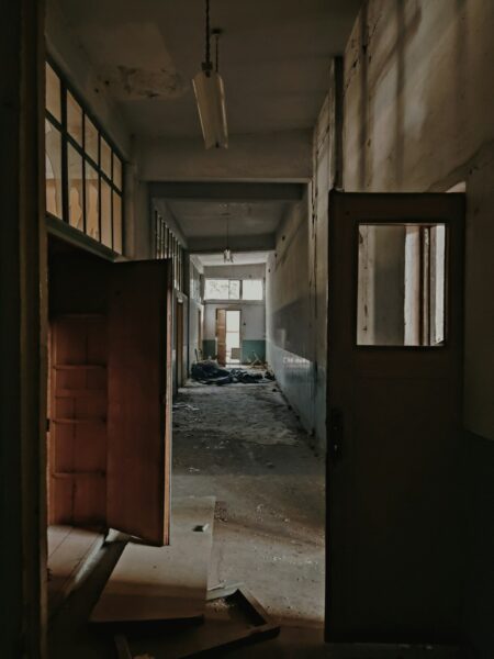 An empty hallway in an abandoned building