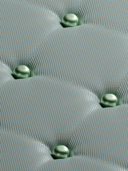 A close-up of a metal surface with a lot of bubbles