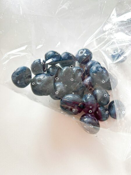 Blueberries are in a clear plastic bag