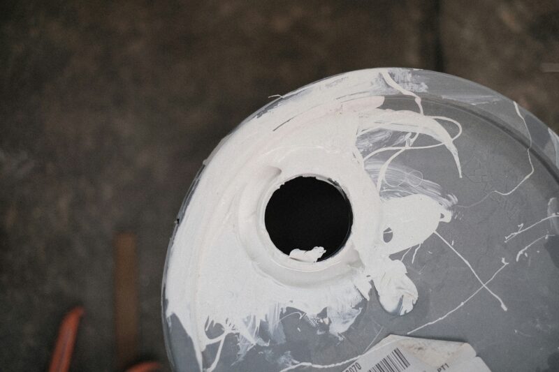 A close-up of a white paint covered object