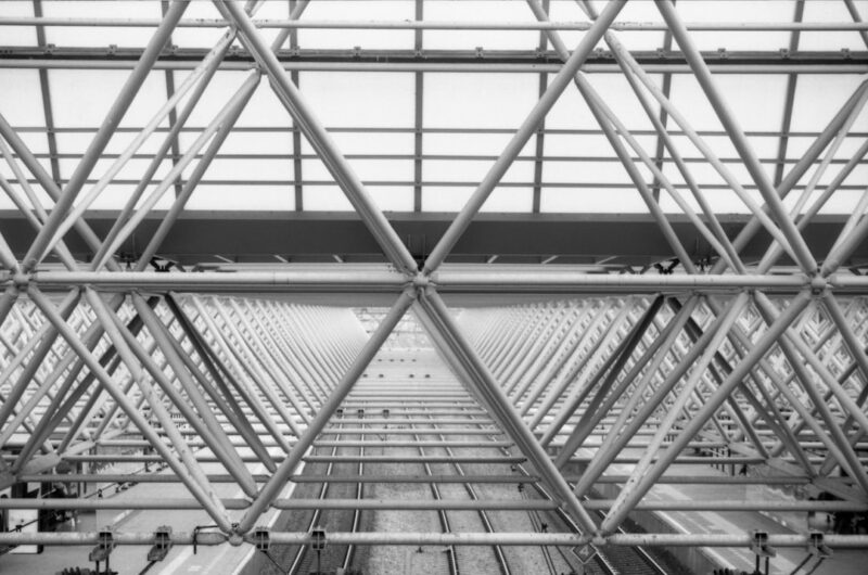 a black and white photo of a train station