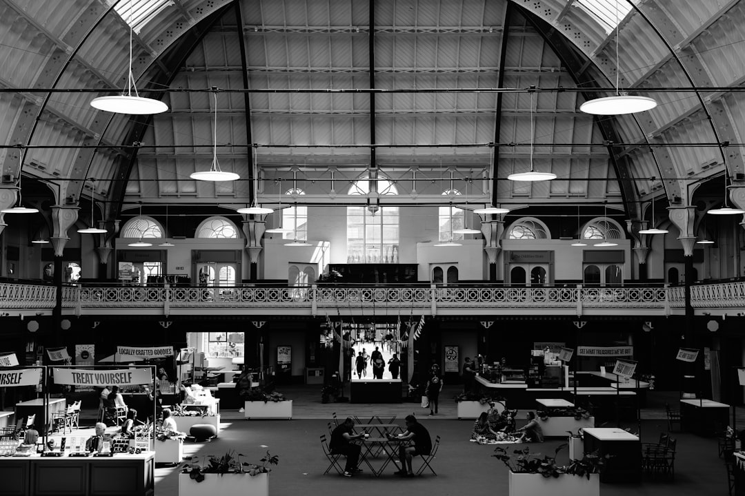 Interior view of a large, ornate market hall.