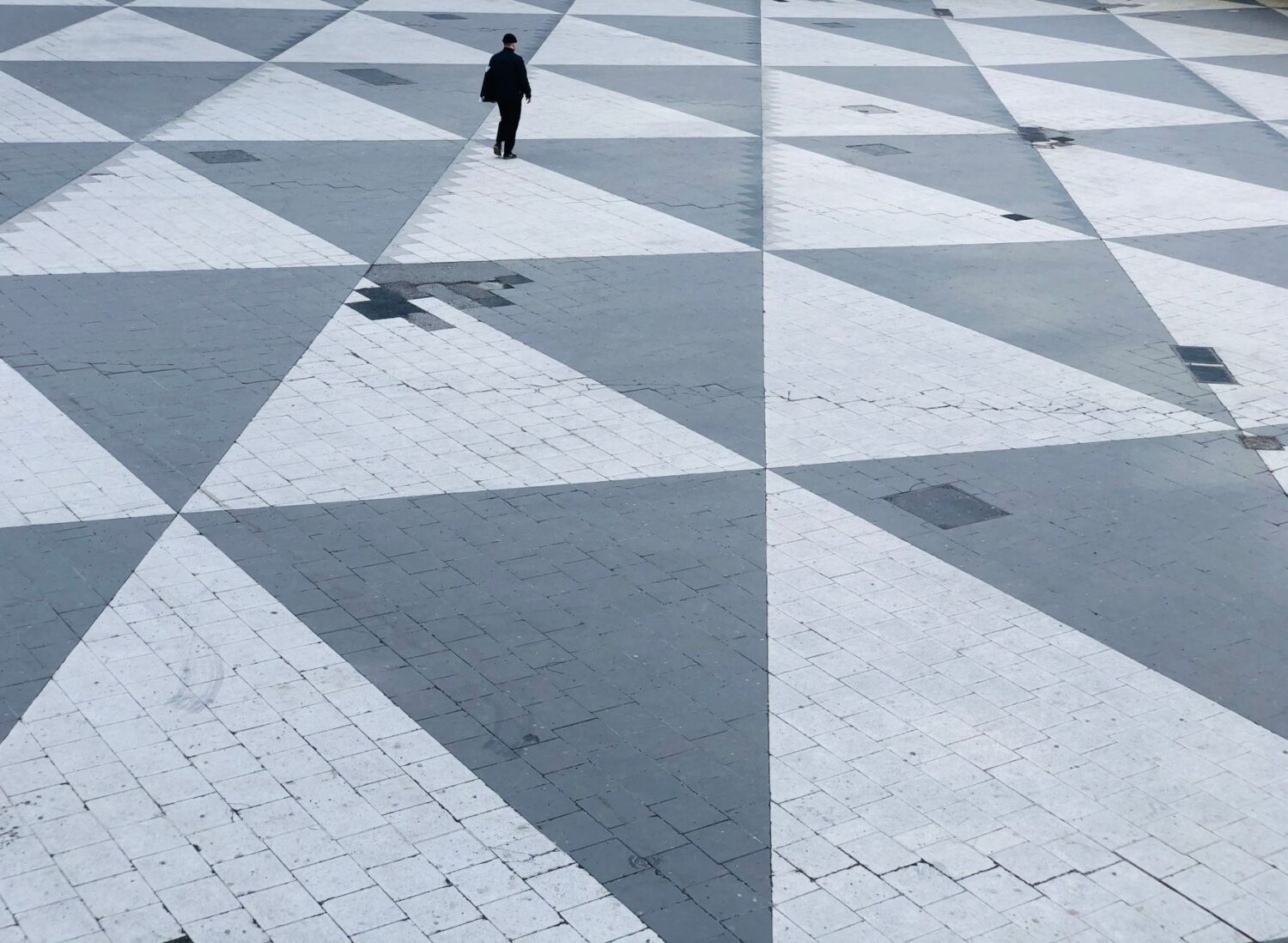 A patterned pedestrian plaza shows how paving can define public space and movement.